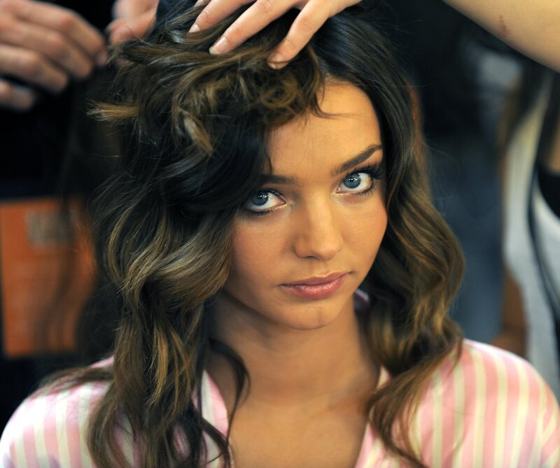 woman getting hair styled