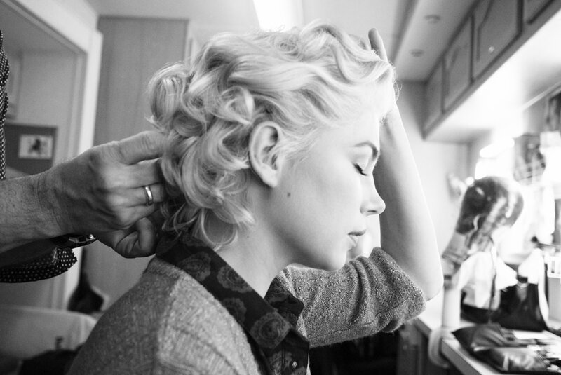 woman getting her hair styled
