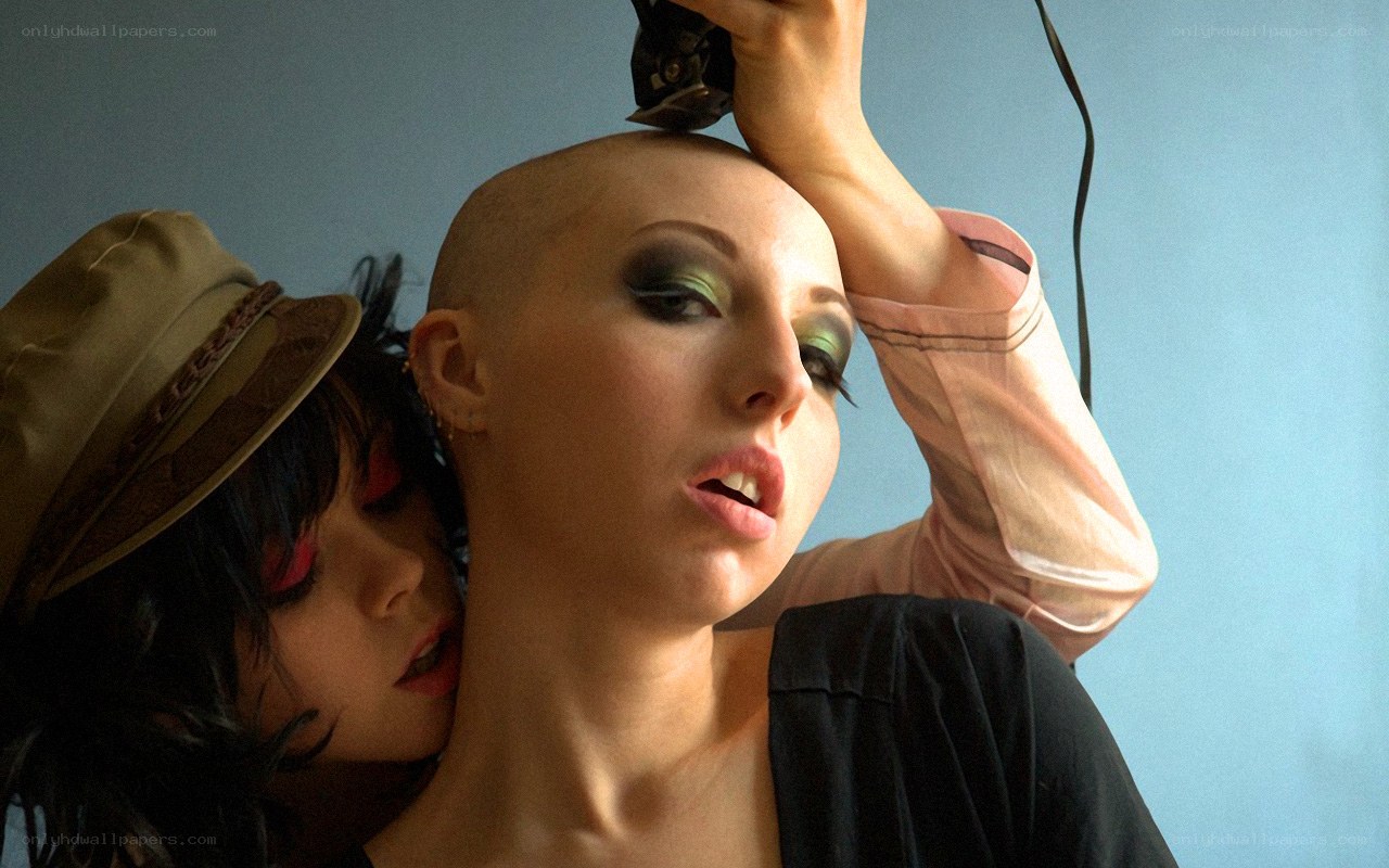 woman getting her head shaved