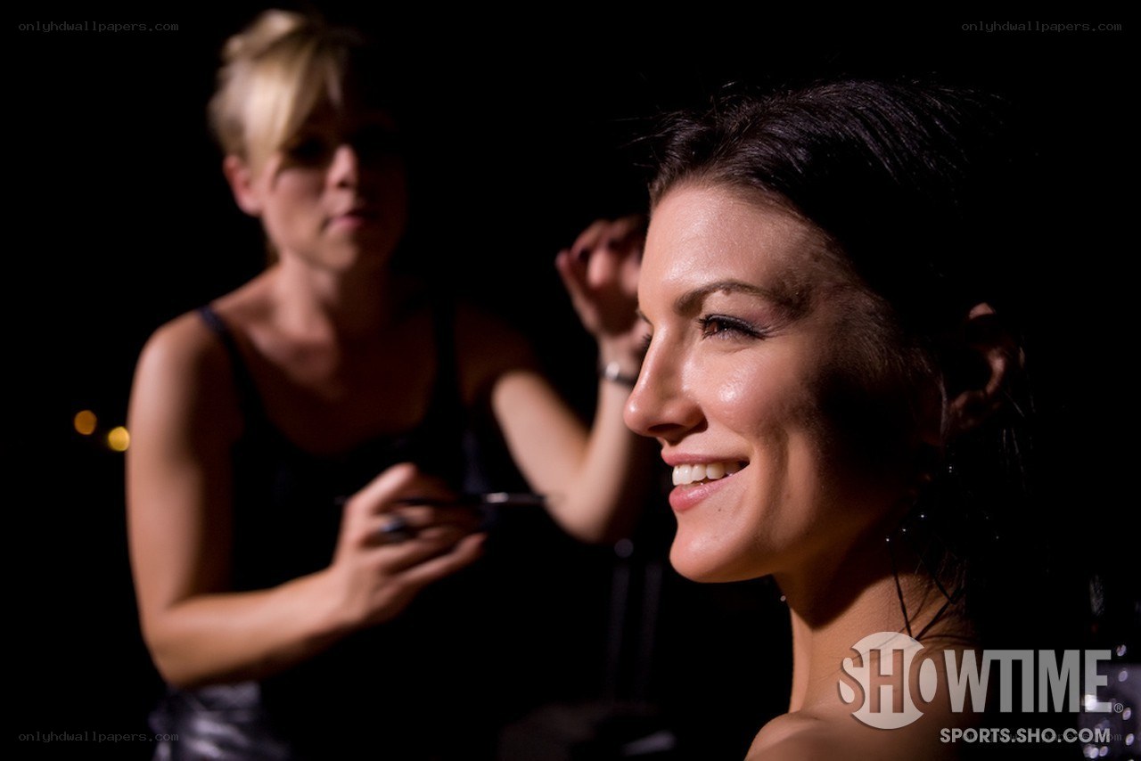 woman getting makeup applied
