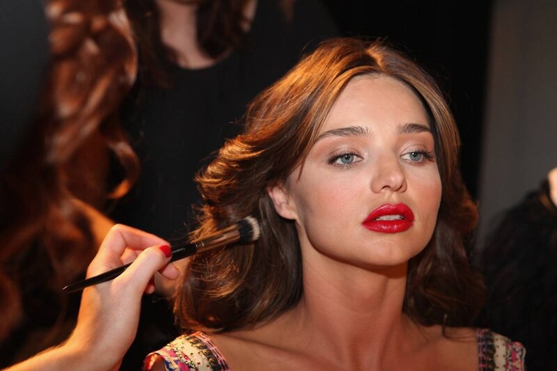 Woman Getting Makeup — Brown, Focused