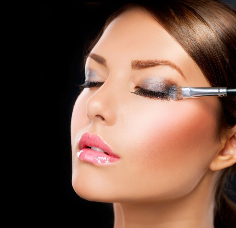 Woman Getting Makeup — Brown
