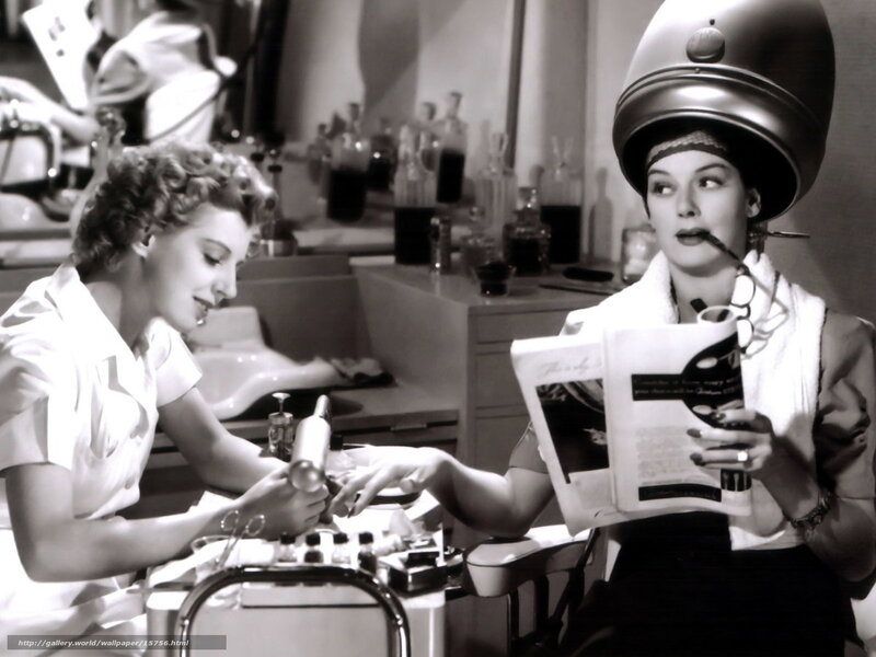 Woman getting manicure at salon