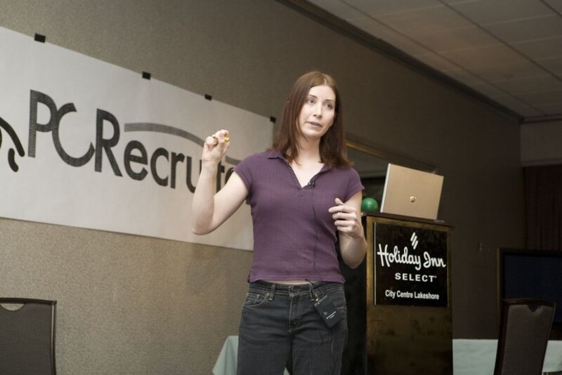 woman giving presentation at event