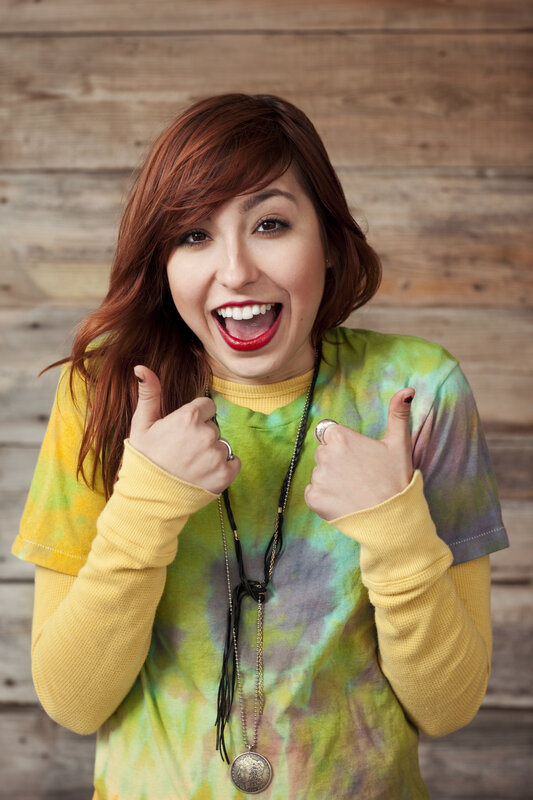 woman giving thumbs up