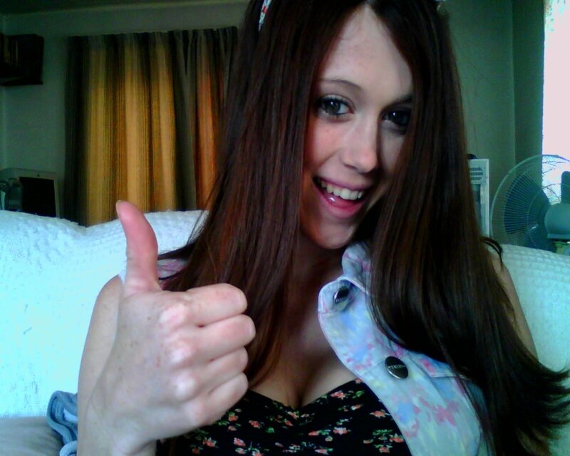 Woman Giving Thumbs-up — Brown, Happy, Photograph