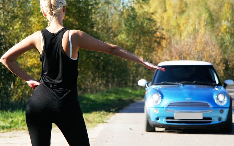 woman hailing a car