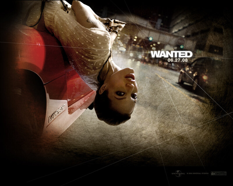 Woman Hanging from Car
