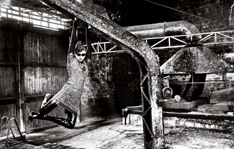 woman hanging in industrial setting