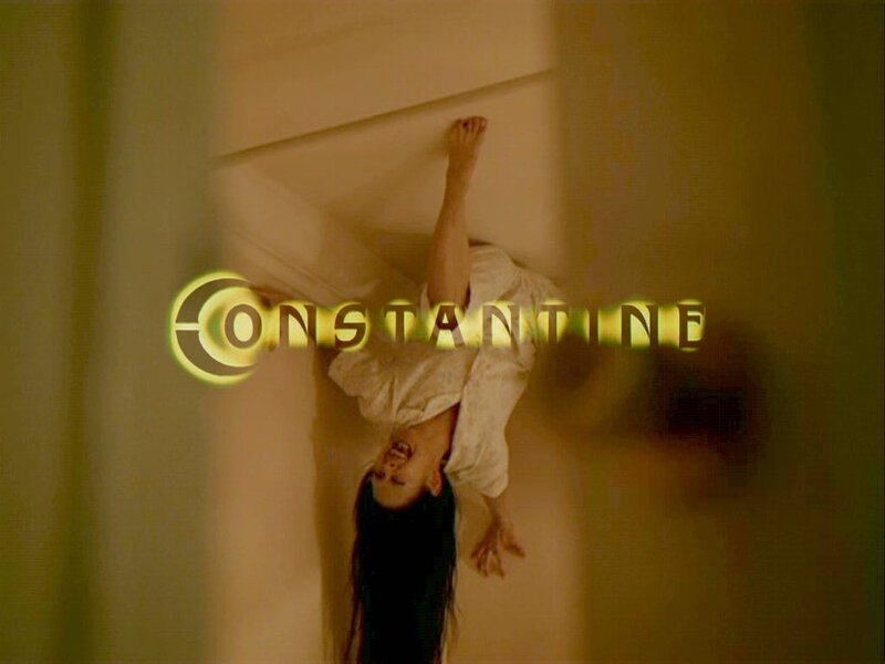 Woman hanging upside down in horror scene