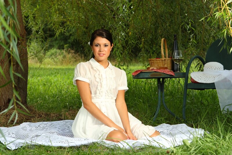 Woman having a picnic outdoors