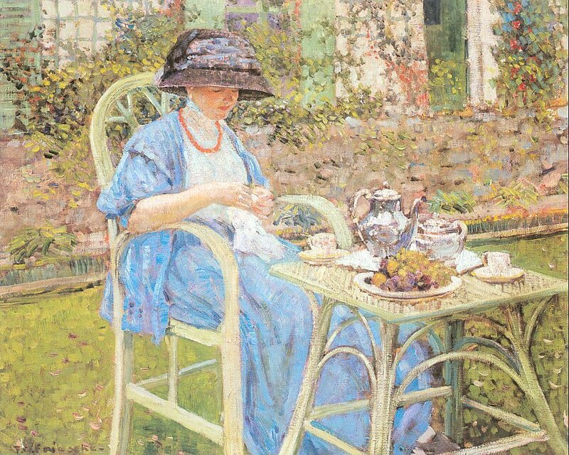 Woman having tea in garden