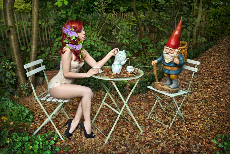 Woman Having Tea with Gnome