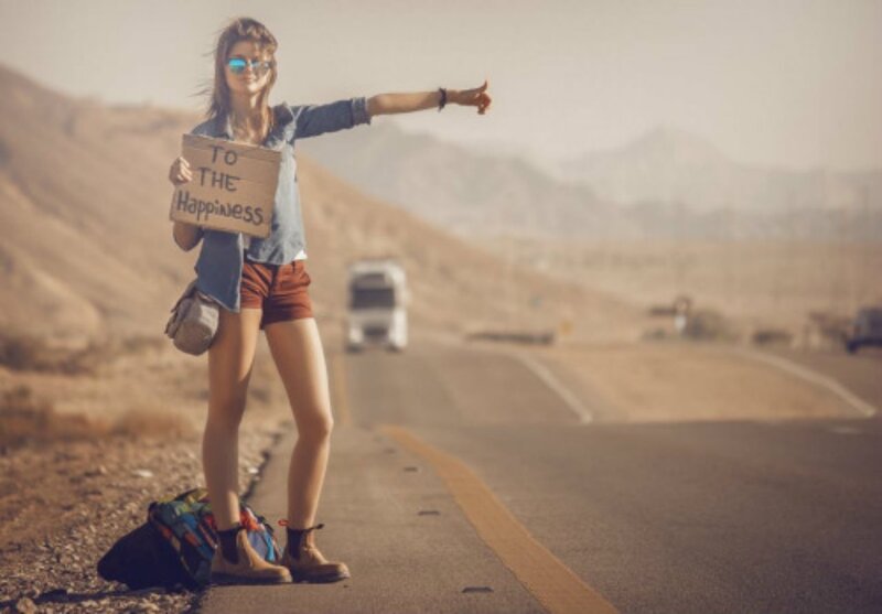 Woman Hitchhiking on Road — Brown, Open