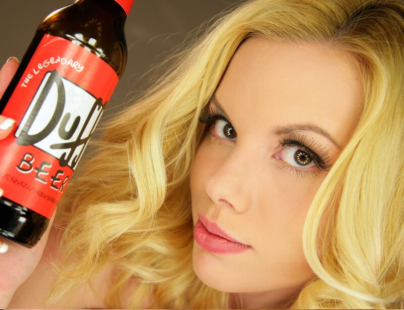 Woman holding a beer bottle