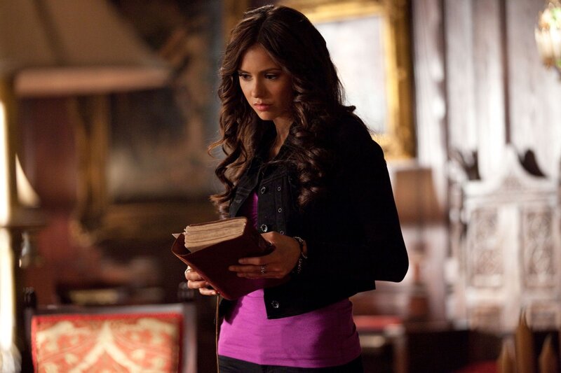 woman holding a book