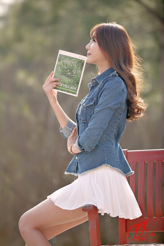 woman holding a brochure