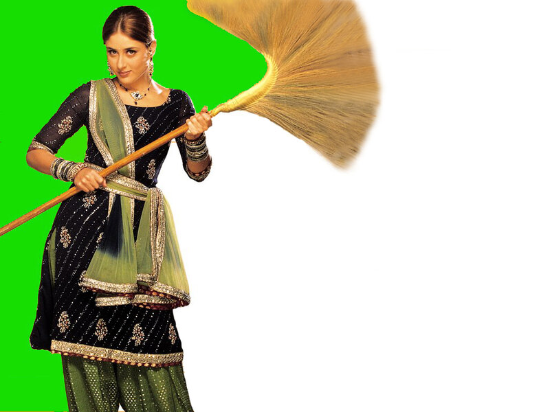 woman holding a broom