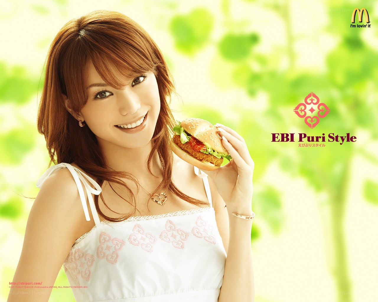 Woman holding a burger