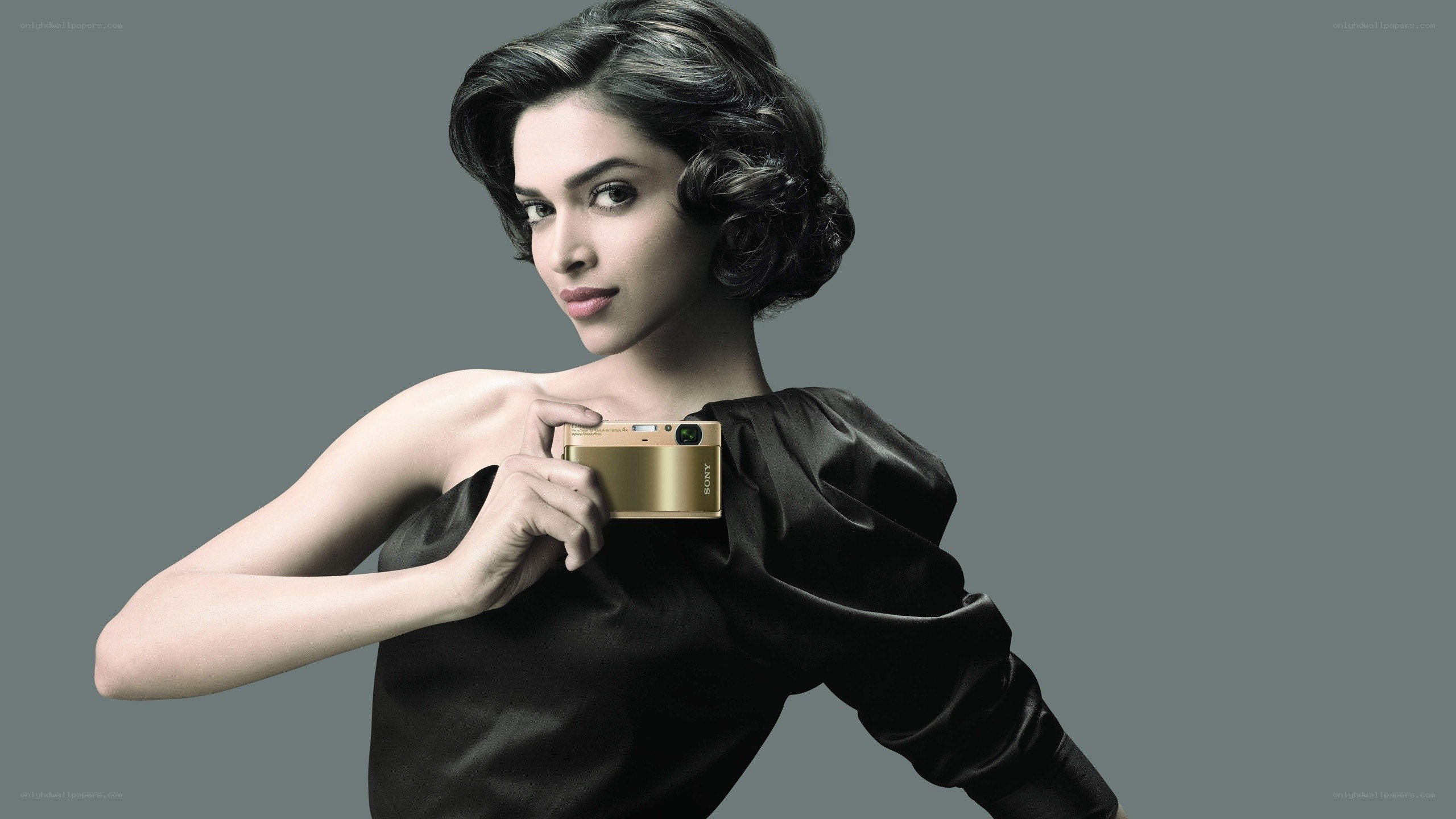 woman holding a camera