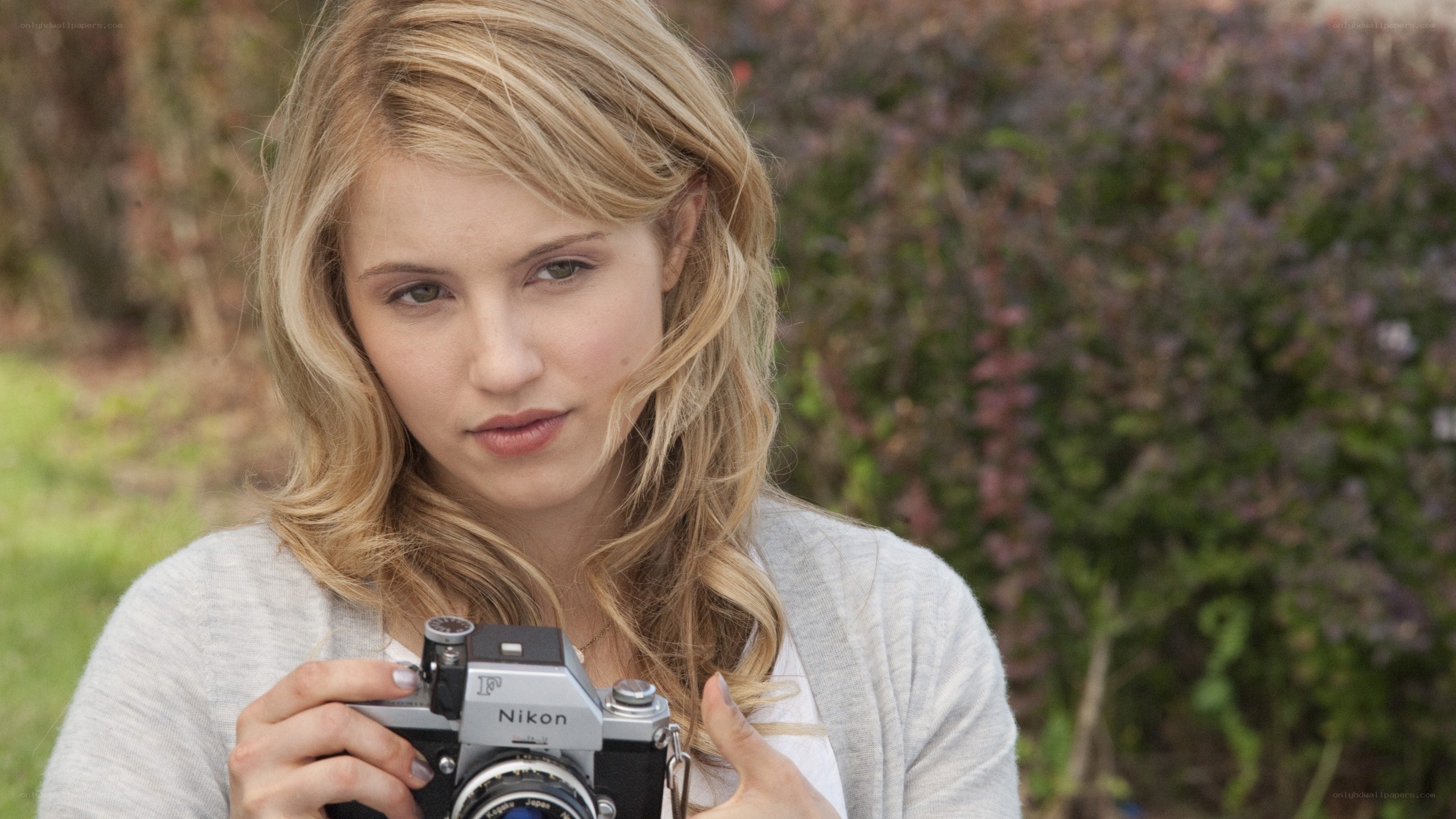 woman holding a camera