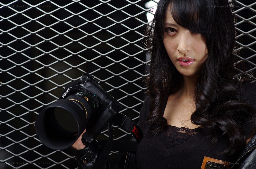 Woman holding a camera