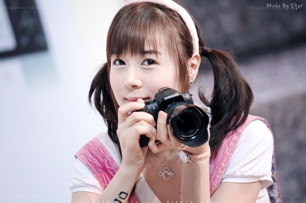 woman holding a camera