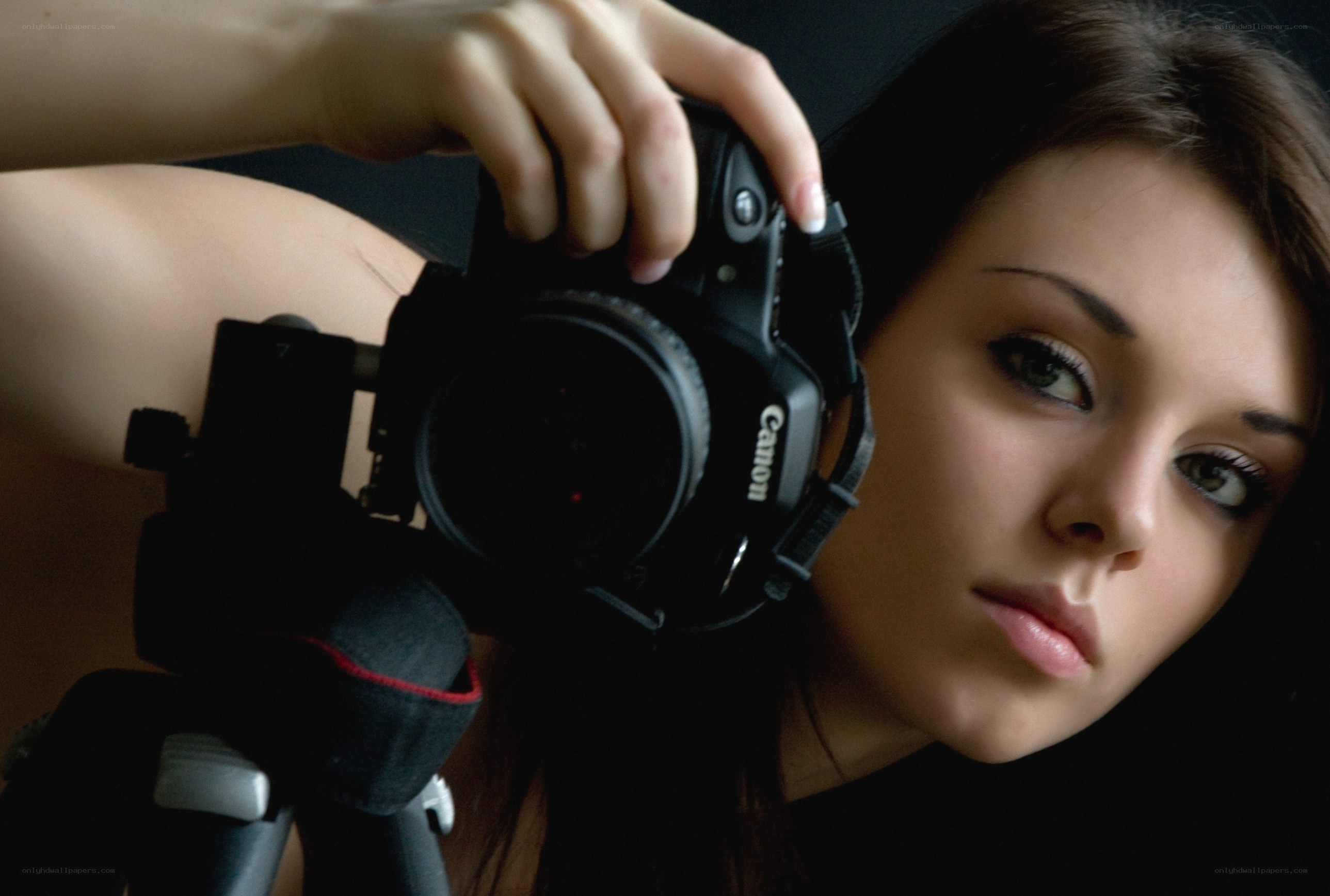 woman holding a camera