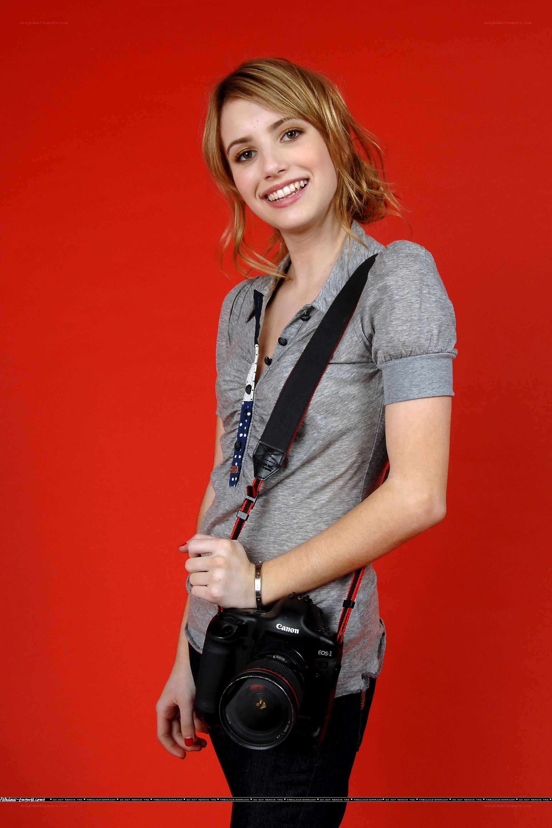 woman holding a camera
