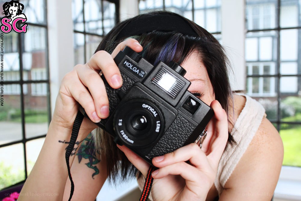woman holding a camera