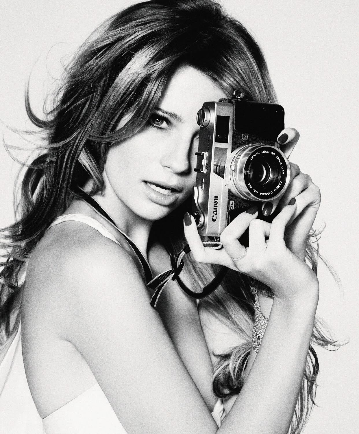 woman holding a camera