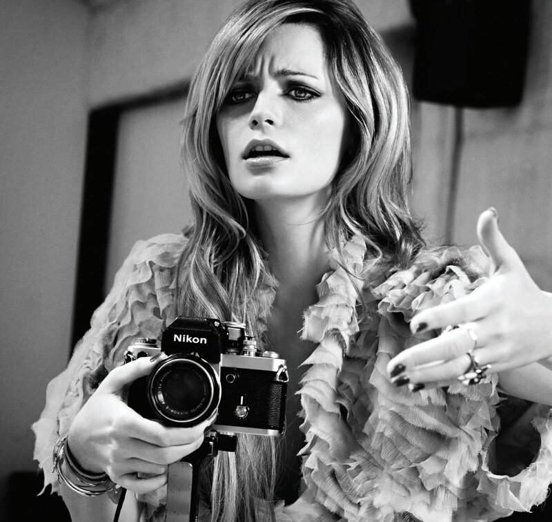 Woman holding a camera