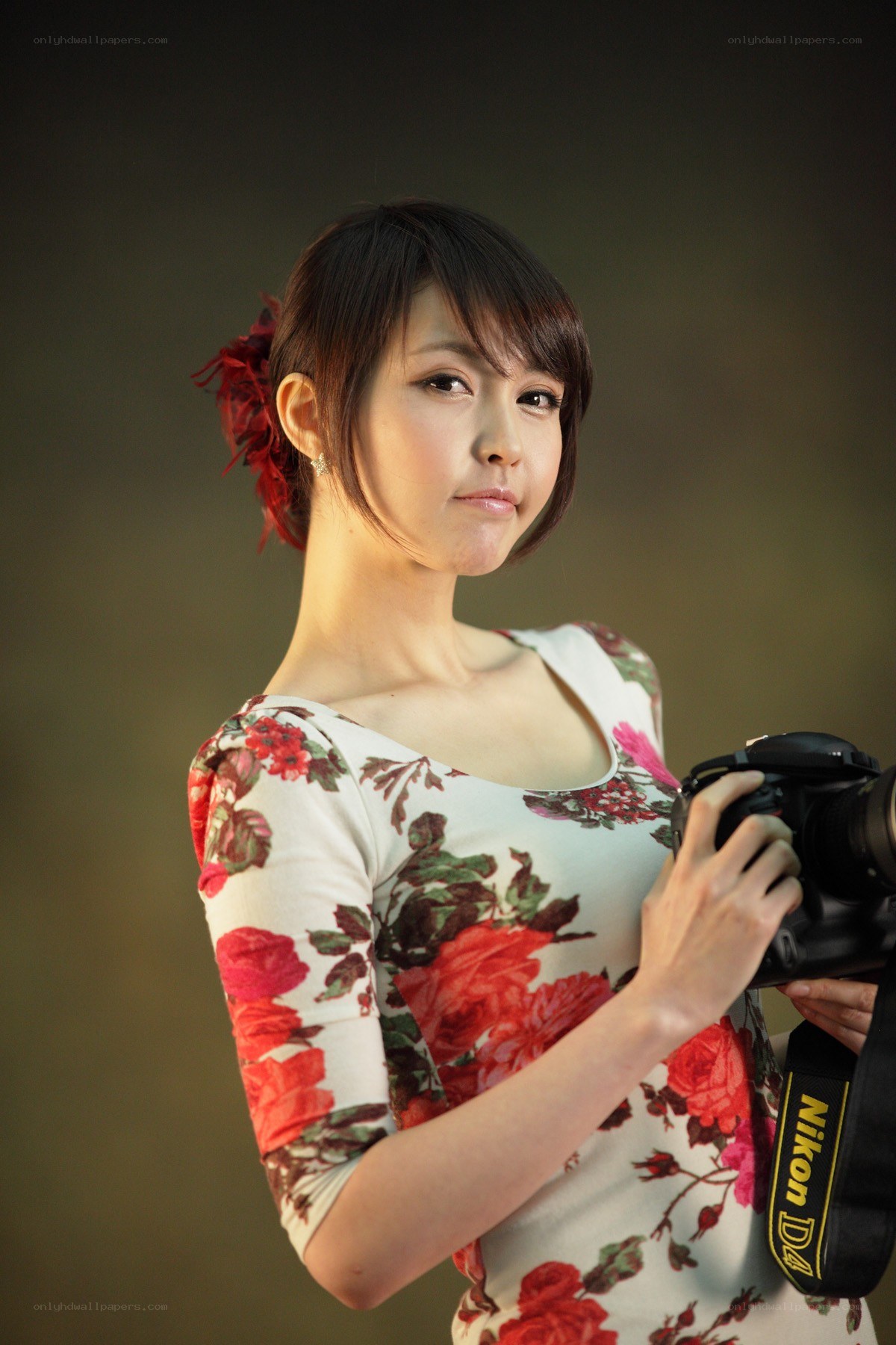 woman holding a camera