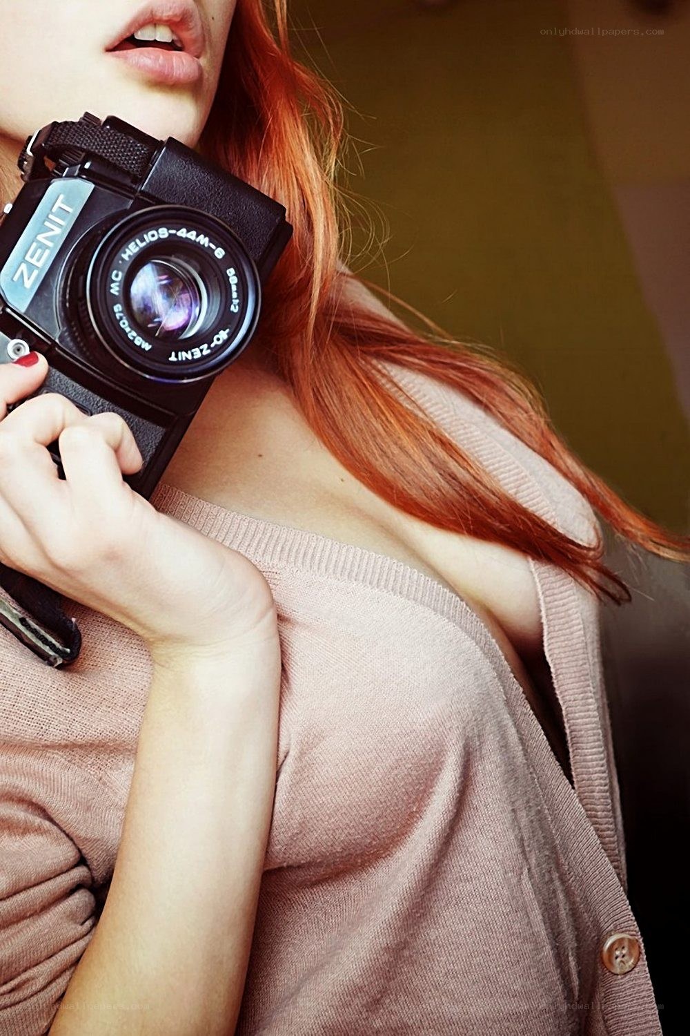 Woman holding a camera