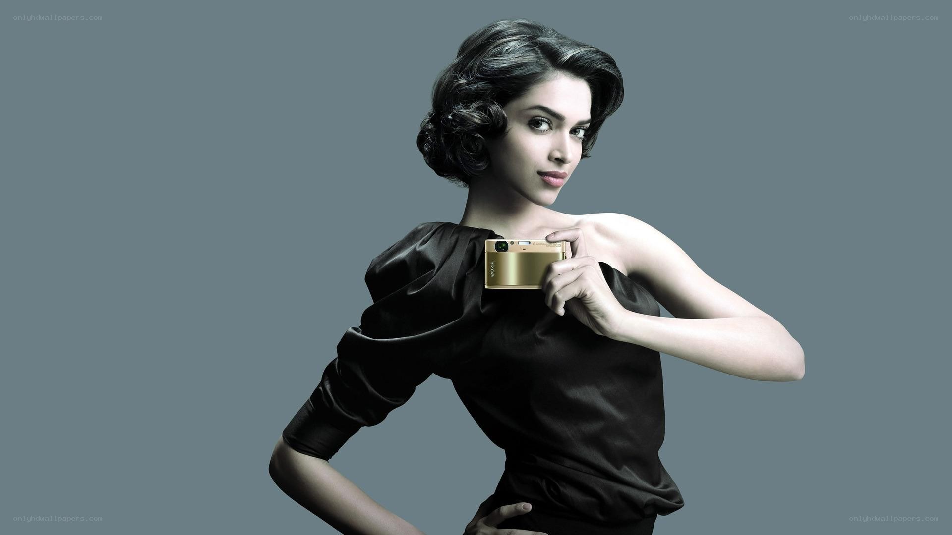 woman holding a camera