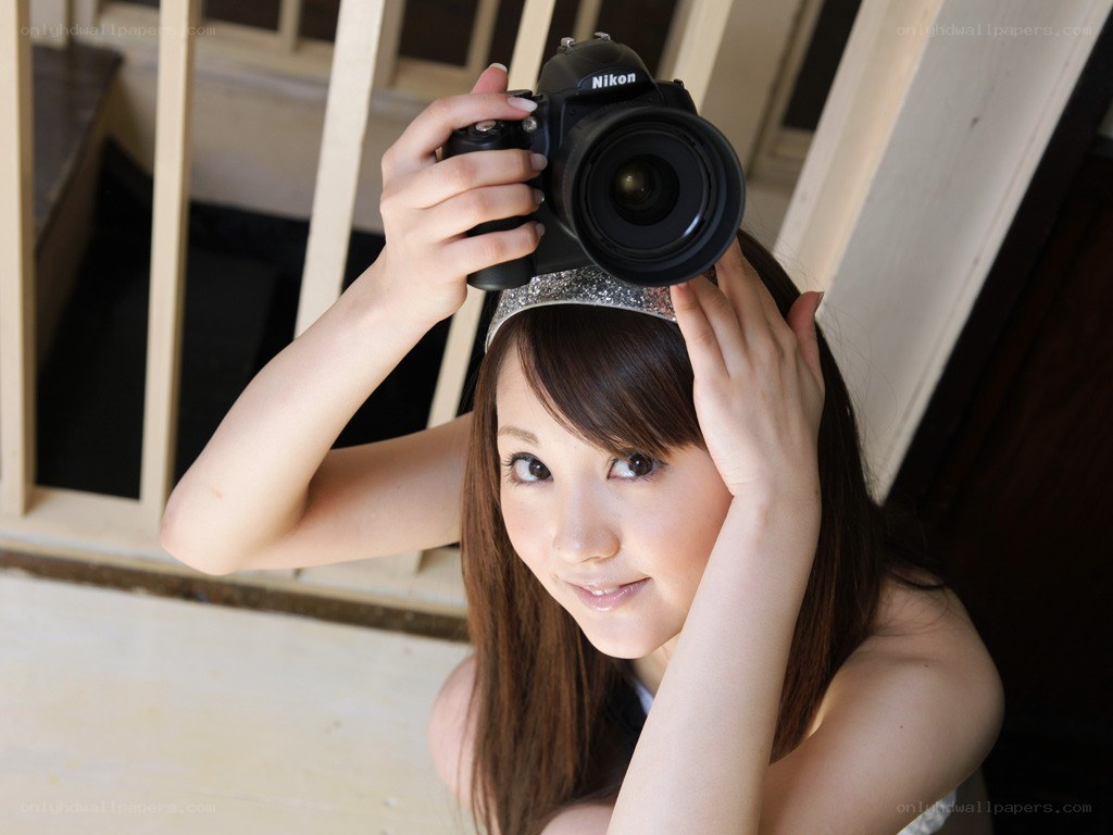 Woman holding a camera