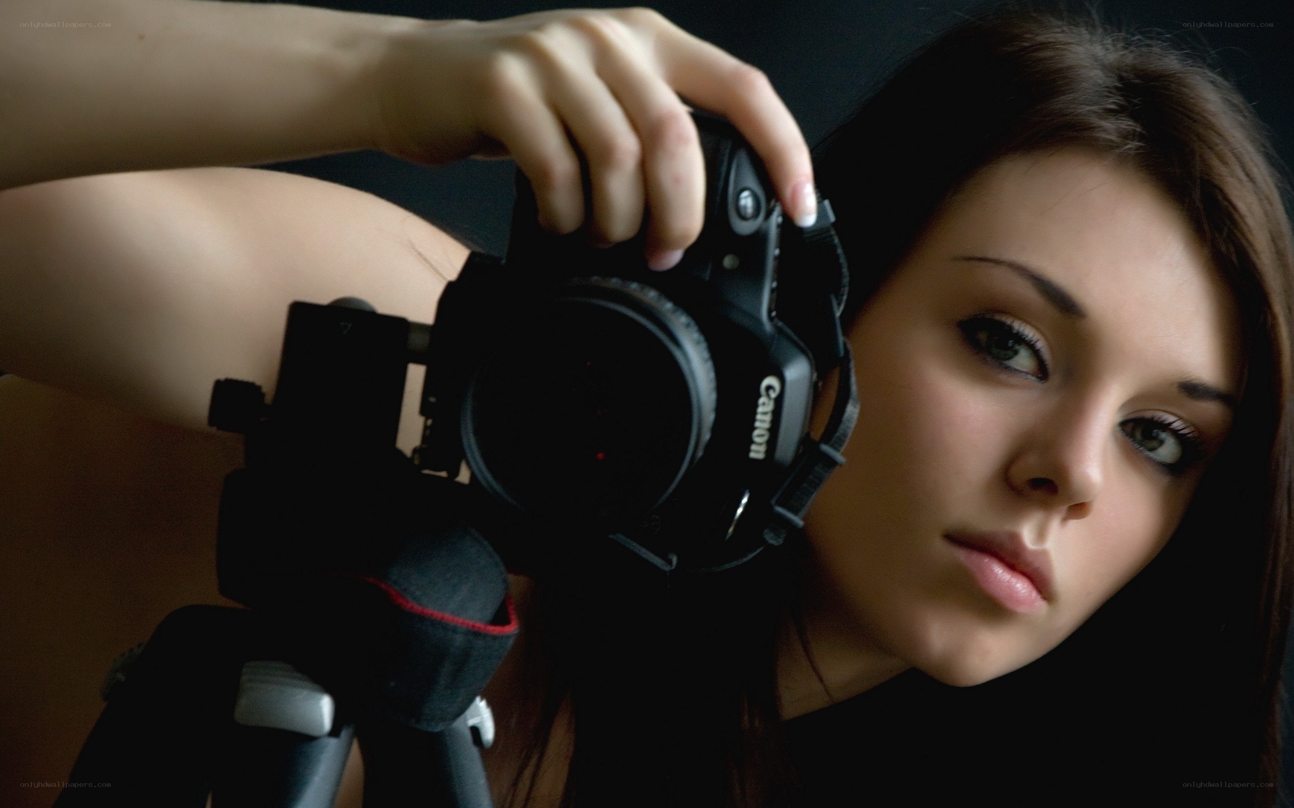 woman holding a camera