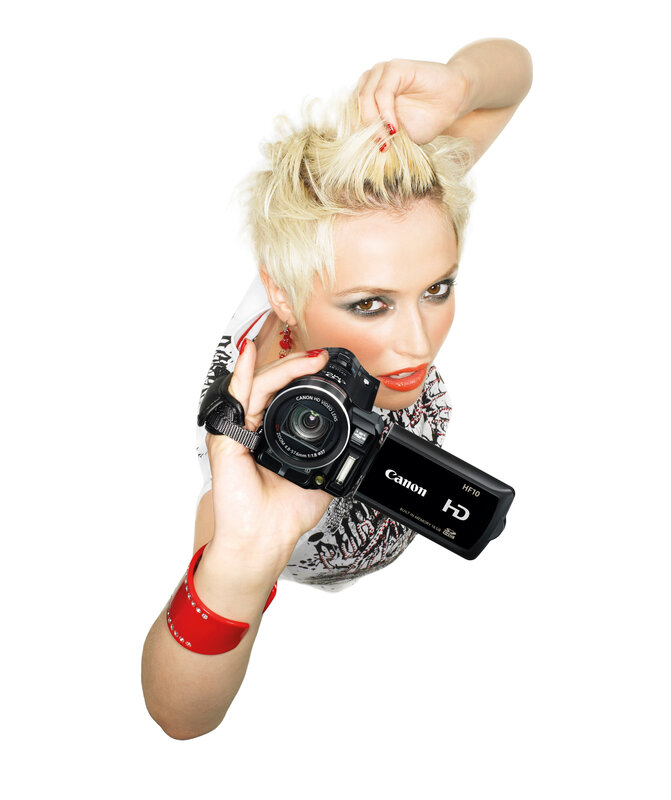 Woman holding a Canon camera
