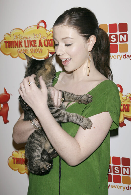 woman holding a cat