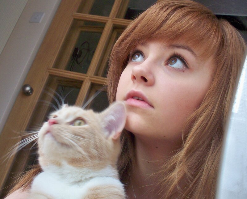 woman holding a cat