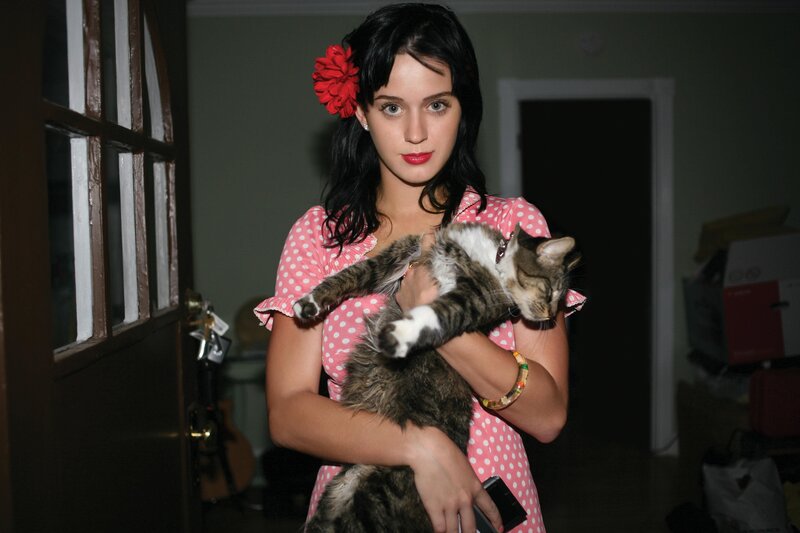 woman holding a cat