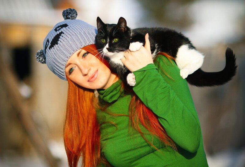 Woman holding a cat