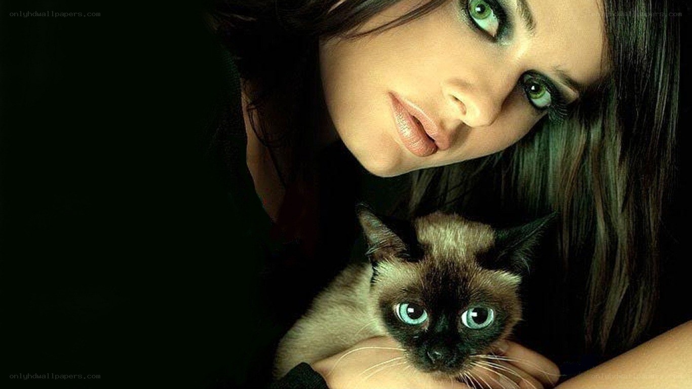 woman holding a cat