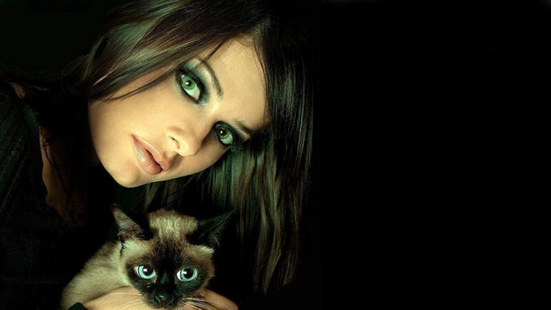 Woman Holding a Cat — Black