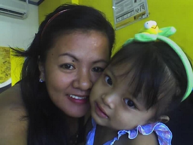 woman holding a child