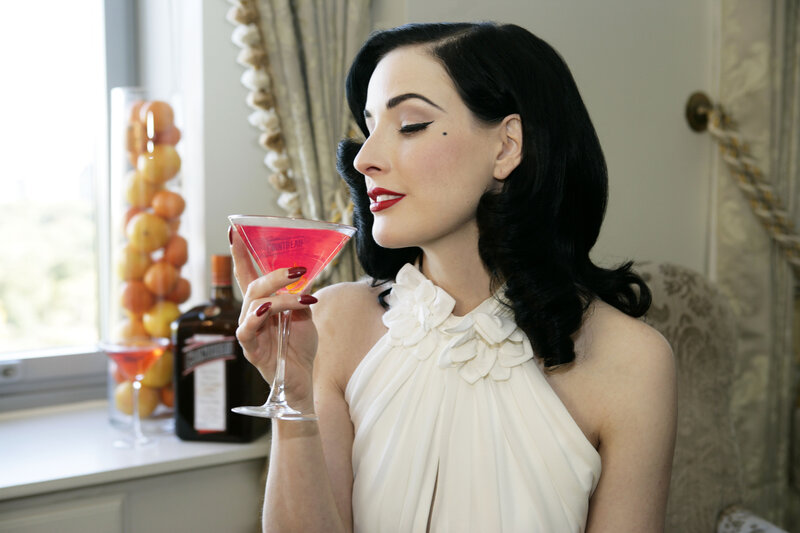 woman holding a cocktail