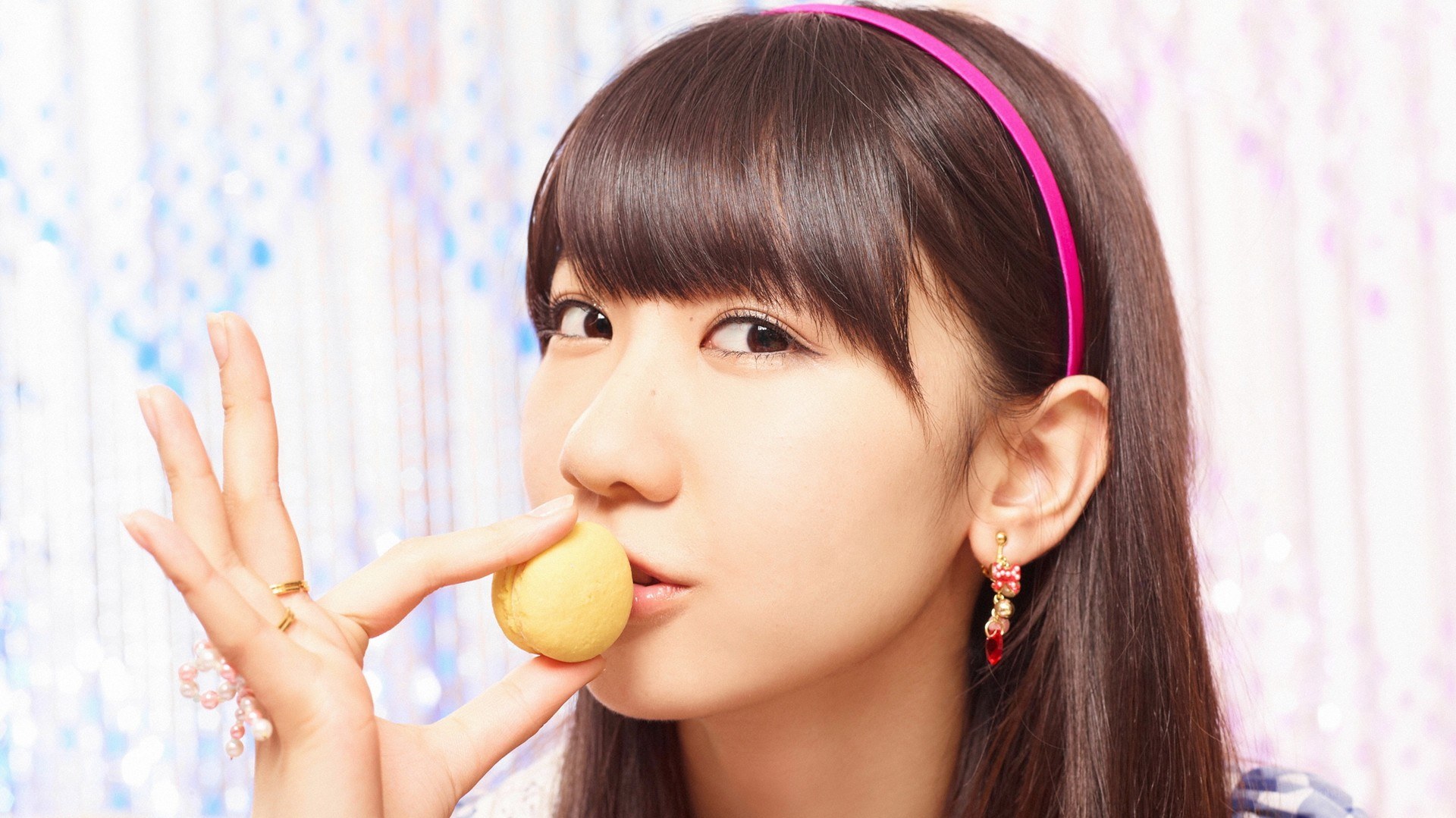 woman holding a cookie