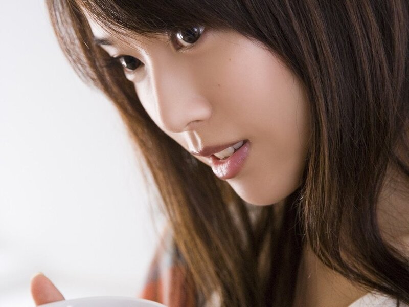 woman holding a cup