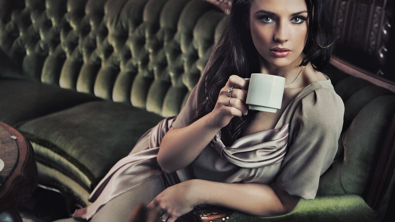 woman holding a cup