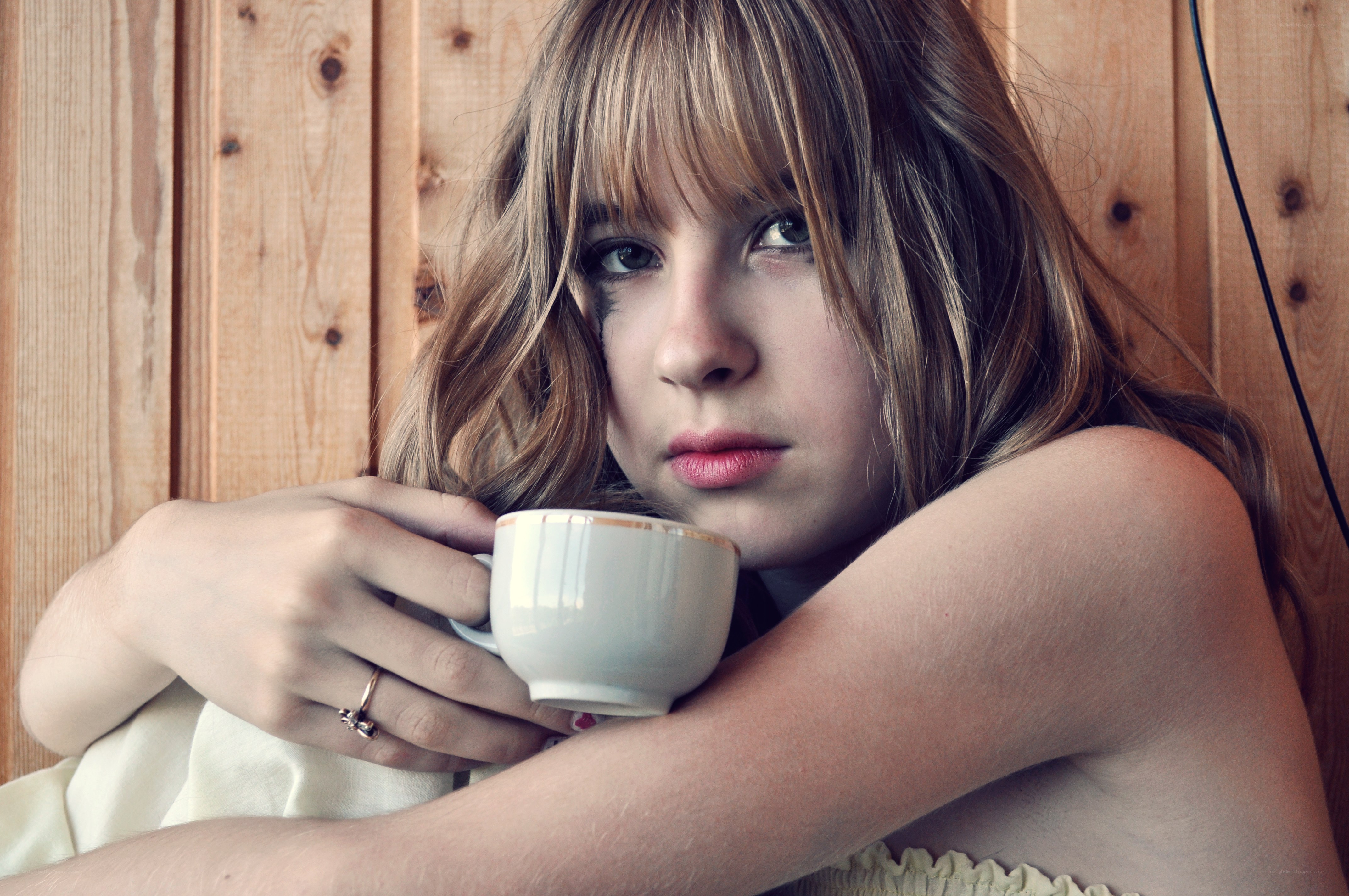 woman holding a cup